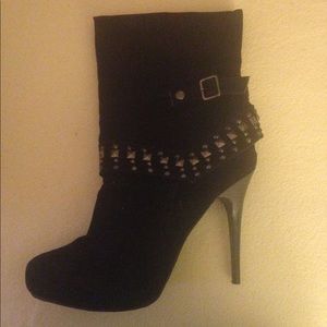 High heeled sexy black boots